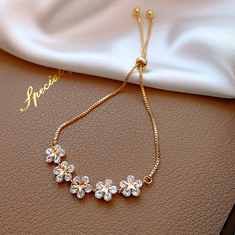 Bratara model floral placat aur 18k golden blossom pietre de zirconiu otel inoxidabil inox kracer kracer.ro bijuterii