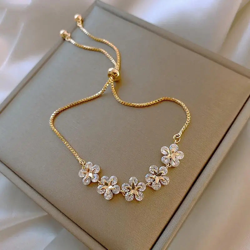 Bratara model floral placat aur 18k golden blossom pietre de zirconiu otel inoxidabil inox kracer kracer.ro bijuterii