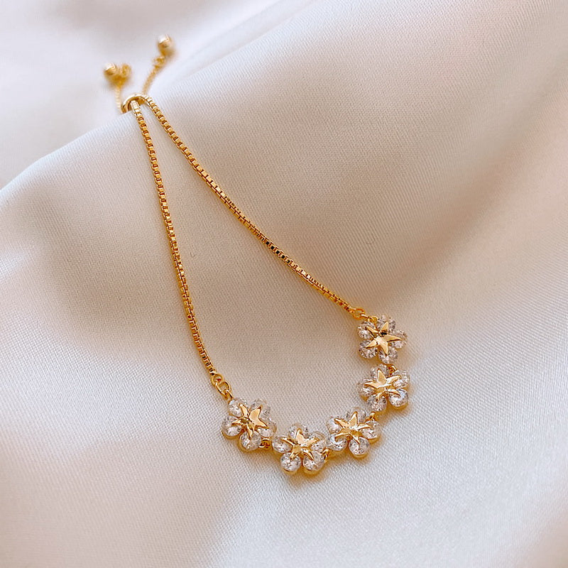 Bratara model floral placat aur 18k golden blossom pietre de zirconiu otel inoxidabil inox kracer kracer.ro bijuterii
